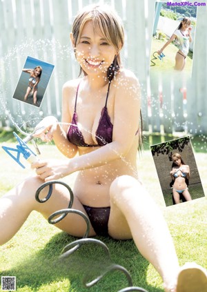 A woman in a blue and white bikini posing by a pool.